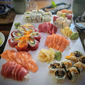 Asaka Sushi & Bar - On the platter from top: California roll, rainbow roll, cherry blossom roll, salmon skin roll with maguro and sake sashimi. - Sushi Bars Near Me - Berkeley, California Asaka Sushi & Bar - On the platter from top: California roll, rainbow roll, cherry blossom roll, salmon skin roll with maguro and sake sashimi. - Sushi Bars Near Me - Berkeley, California