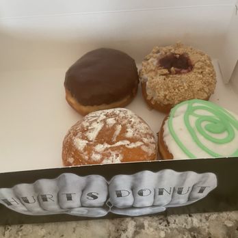 Hurts Donut - Barvarian cream, strawberry cheesecake, lemon filled, key lime donuts - Donuts Near Me - Coralville, Iowa Hurts Donut - Barvarian cream, strawberry cheesecake, lemon filled, key lime donuts - Donuts Near Me - Coralville, Iowa