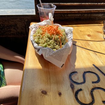 Shark Shack - a bowl of food on a wooden table - Pubs Near Me - Sicamous, British Columbia