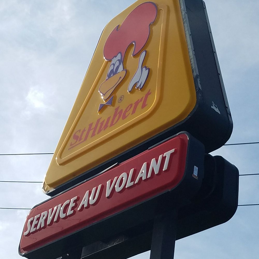 St-Hubert - a sign for a service au volant - Barbeque Near Me - Candiac, Quebec St-Hubert - a sign for a service au volant - Barbeque Near Me - Candiac, Quebec