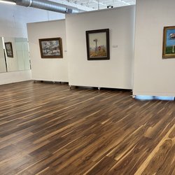 Bright Coffee - Studio space in the back of the shop with paintings for sale on the walls.