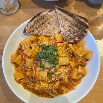 Rebel Kitchen + Bar - Rigatoni Red Pepper Pesto with Chicken - Bars Near Me - Lombard, Illinois Rebel Kitchen + Bar - Rigatoni Red Pepper Pesto with Chicken - Bars Near Me - Lombard, Illinois