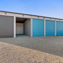 Fully enclosed RV and boat storage units at Carefree Covered RV Storage in Wylie, Texas.