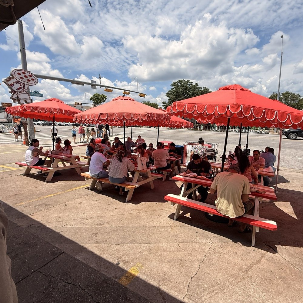 Home Slice Pizza - Thank goodness for umbrellas - Pizza Near Me - Austin, Texas Home Slice Pizza - Thank goodness for umbrellas - Pizza Near Me - Austin, Texas