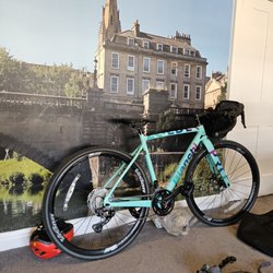Julian House Bike Workshop - He fixed this Bianchi Zolder Pro's chain, pumped tires and installed pedals aka pretty much made sure we would be safe on our journey.