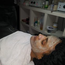 "Epiphany" Facial, Body, and Wax Lounge - Bentonite clay detox mask applications.