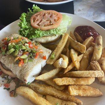 Riptides Raw Bar & Grill - Mahi Sandwich and fries - Seafood Near Me - Ormond Beach, Florida Riptides Raw Bar & Grill - Mahi Sandwich and fries - Seafood Near Me - Ormond Beach, Florida