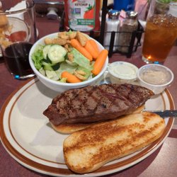 Uncle Charlie's - Steak sandwich and salad.
