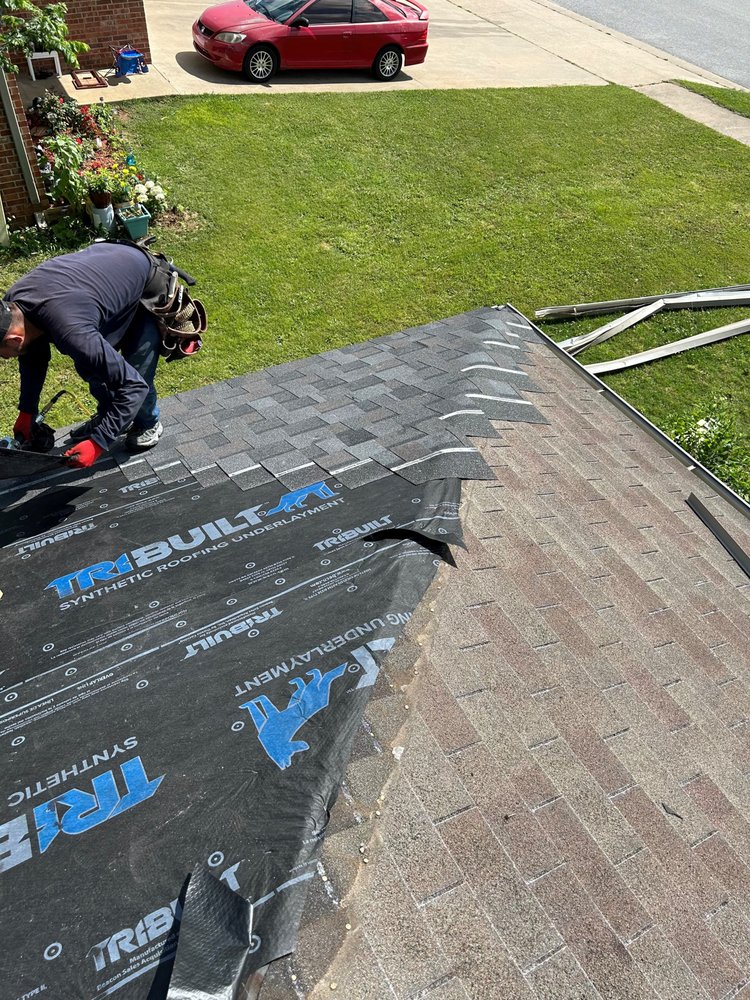 Slide of T2K Roofing