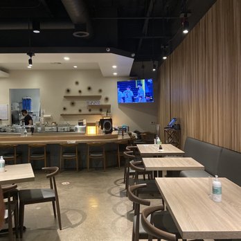 Haru Sushi And Grill - View when you walk in, sushi bar is in distance and cool huge sea urchins on wall - Sushi Bars Near Me - Glendale, Arizona