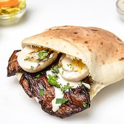 Sharonna’s Magically Baked Goods - Sabich is an Israeli sandwich based on a traditional Iraqi Jewish dish. It consists of pita stuffed with fried eggplant and hard boiled eggs