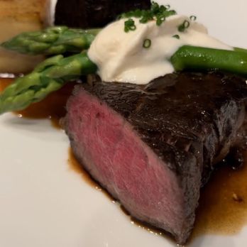 Routes Culinary Travels - Coffee Cured Beef Tenderloin potato pave, asparagus, horseradish cream, red wine bordelaise - Personal Chefs Near Me Routes Culinary Travels - Coffee Cured Beef Tenderloin potato pave, asparagus, horseradish cream, red wine bordelaise - Personal Chefs Near Me