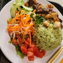 Bowl with cilantro rice, chicken and pork Bowl with cilantro rice, chicken and pork