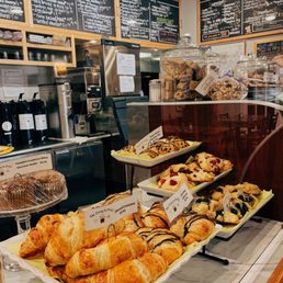 a variety of pastries on display a variety of pastries on display