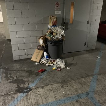 Apex Hudson Riverfront - 2nd floor garage entrance with overflowing garbage - Apartments Near Me - Yonkers, New York Apex Hudson Riverfront - 2nd floor garage entrance with overflowing garbage - Apartments Near Me - Yonkers, New York