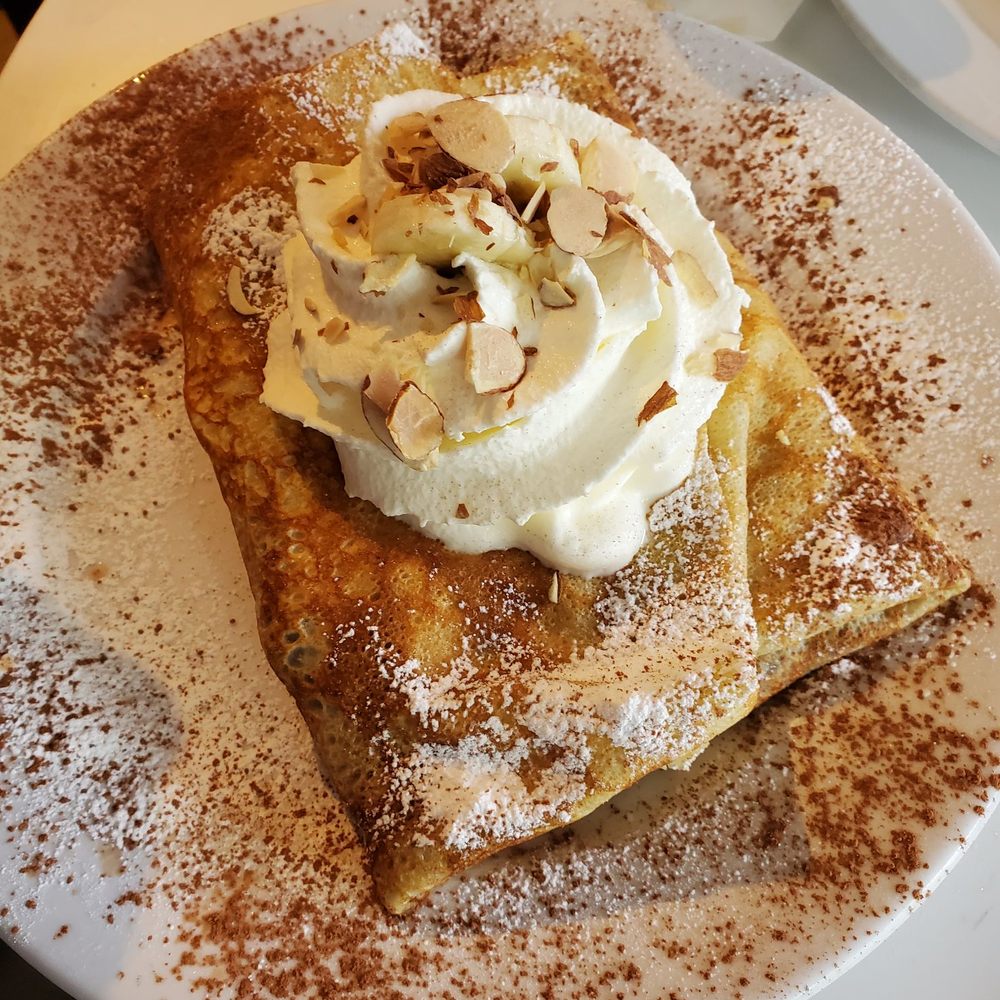 Number 1 crepe- bananas, whipped cream, Nutella and sliced almonds Number 1 crepe- bananas, whipped cream, Nutella and sliced almonds
