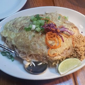 Jamjuree Thai Cuisine - Pad thai with egg on top - Thai Near Me - Seattle, Washington Jamjuree Thai Cuisine - Pad thai with egg on top - Thai Near Me - Seattle, Washington