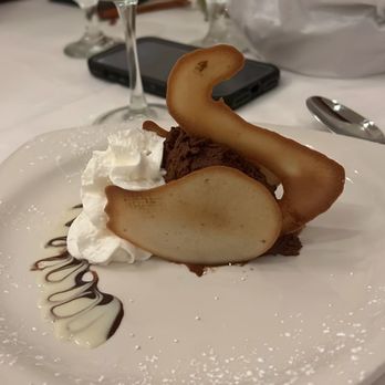 Pier 95 Restaurant - Marina - Chocolate mousse with whipped cream & swan cookies - Seafood Near Me - Freeport, New York Pier 95 Restaurant - Marina - Chocolate mousse with whipped cream & swan cookies - Seafood Near Me - Freeport, New York