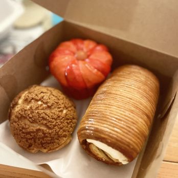 T55 Patisserie - Durian choux, milk bread (guava and passionfruit i think), cinnamon croissant is amazing - Desserts Near Me - Bothell, Washington