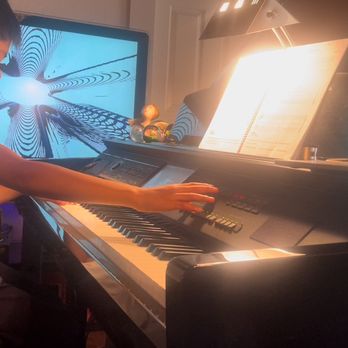 Laura Annette Duncan - I love using the iTunes visualizer in the background.   When I take movies of my students  performing they look like stars! - Musical Instruments & Teachers Near Me - Clovis, California