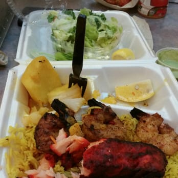 Kabob Palace - Salmon and shrimp with yellow rice. - Afghan Near Me - Arlington, Virginia