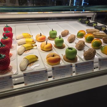 Sal de Riso - Display case of delicious artisan dessert to pretty to eat. - Ice Cream & Frozen Yogurt Near Me - Minori, SA