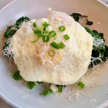 Stella's - Black Kale Salad: Buttered bread topped with black kale and two over easy eggs. Quite tasty and the kale was perfectly cooked! - Mediterranean Near Me - Richmond, Virginia Stella's - Black Kale Salad: Buttered bread topped with black kale and two over easy eggs. Quite tasty and the kale was perfectly cooked! - Mediterranean Near Me - Richmond, Virginia