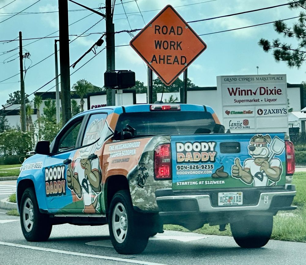 Doody Daddy - The Neighborhood Pooper Scooper Image