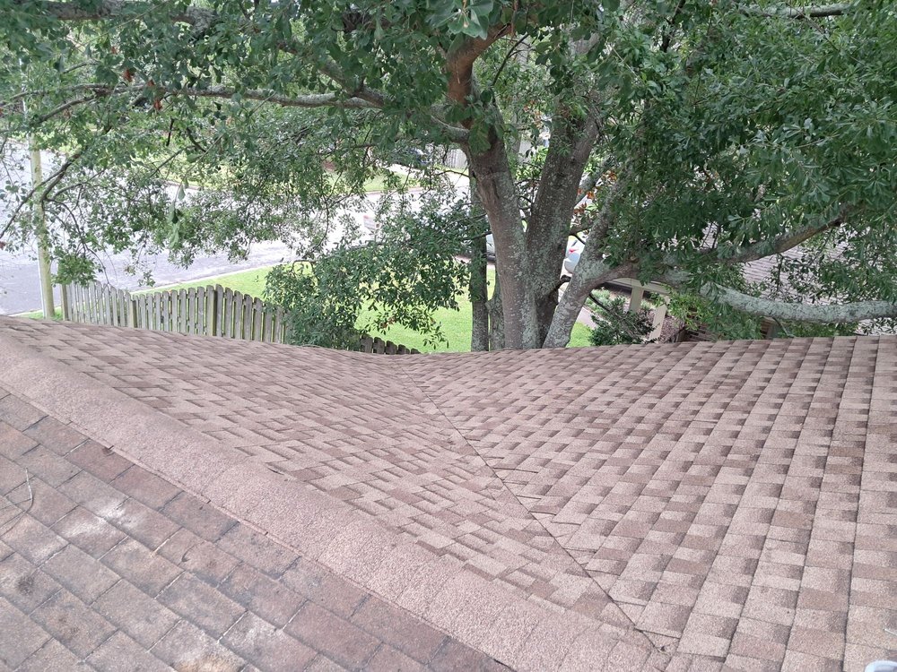 Slide of Three Brothers Roofing