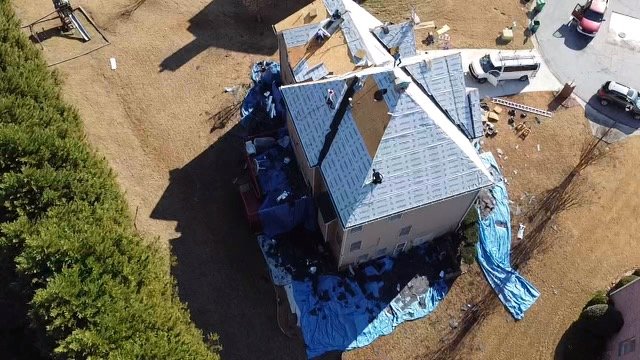 Slide of Storm Hero Roofing & Restoration - Atlanta