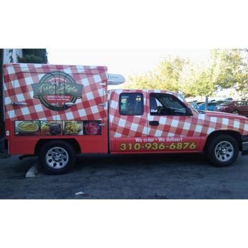 Trinistyle Cuisine - a truck parked in a parking lot - Trinidadian Near Me - Lancaster, California Trinistyle Cuisine - a truck parked in a parking lot - Trinidadian Near Me - Lancaster, California