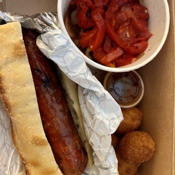 Bar Gernika - a hot dog and a bowl of tomatoes - Spanish Near Me - Boise, Idaho