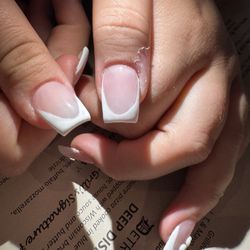 Signature Nails - Different shapes in the polish one has a deeper point tha. The other