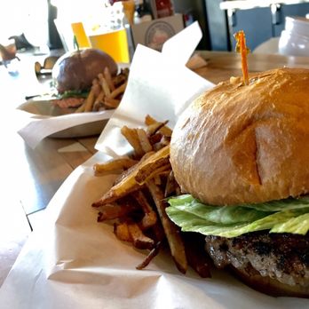 State & Central - Juicy Lucy in front, salmon burger in rear. - Pubs Near Me - Olympia, Washington State & Central - Juicy Lucy in front, salmon burger in rear. - Pubs Near Me - Olympia, Washington