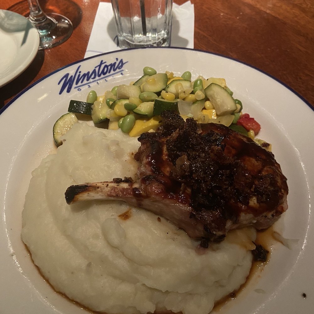 Winston's Grille - Maple bourbon BBQ glazed pork chop, Mashed Potatoes, and mixed vegetables - American Near Me - Raleigh, North Carolina Winston's Grille - Maple bourbon BBQ glazed pork chop, Mashed Potatoes, and mixed vegetables - American Near Me - Raleigh, North Carolina