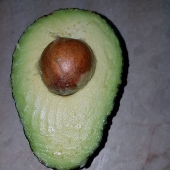 Seafood Kitchen - an avocado cut in half - Seafood Near Me - Houston, Texas