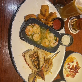 Red Lobster - a plate of food on a table - Seafood Near Me - Fargo, North Dakota