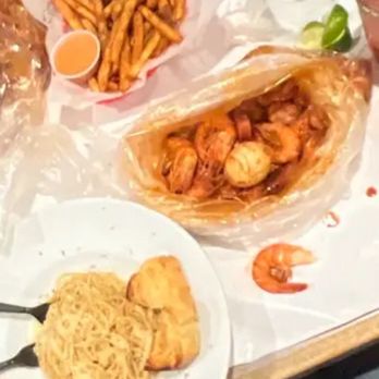 Pirates Kitchen - Cajun Fries (came with some really delicious orange sauce and ketchup) garlic noodles (came with 2 garlic breads) my seafood boil - Cajun/Creole Near Me - Artesia, California Pirates Kitchen - Cajun Fries (came with some really delicious orange sauce and ketchup) garlic noodles (came with 2 garlic breads) my seafood boil - Cajun/Creole Near Me - Artesia, California