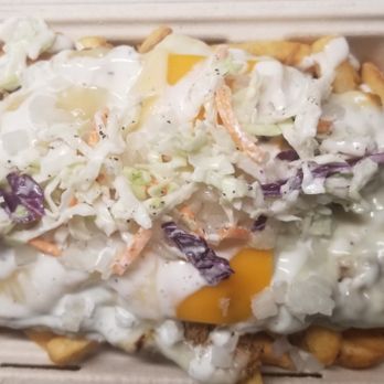 Grilla Cheese - Grilla fries lay beneath your choice of meat, Muenster, Havarti, and Cheddar. Topped with Grilla sauce, onions and coleslaw. - Burgers Near Me - Clackamas, Oregon