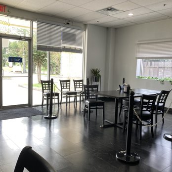 Good Eatz - a restaurant with tables and chairs - Burgers Near Me - Jersey Village, Texas Good Eatz - a restaurant with tables and chairs - Burgers Near Me - Jersey Village, Texas