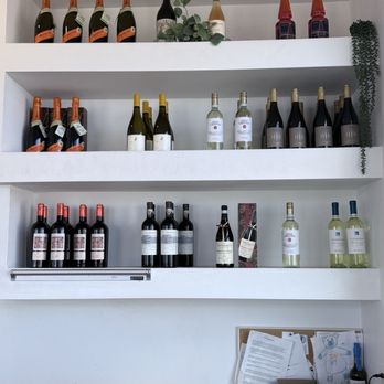 Faro - Shelves of Wine Selections - Pizza Near Me - Flagler Beach, Florida