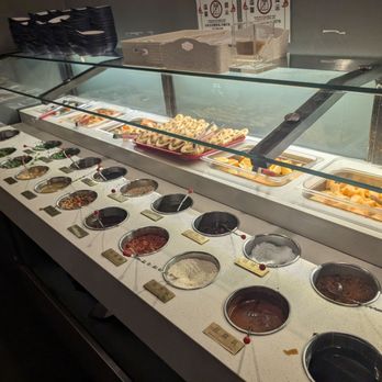 Liuyishou Hotpot - Sauce bar.. mix your own sauce or look for instructions on the wall - Hot Pot Near Me - Bellevue, Washington