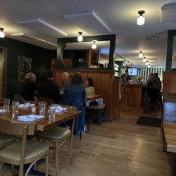 BLUEBiRD - Dining area with bar in the back