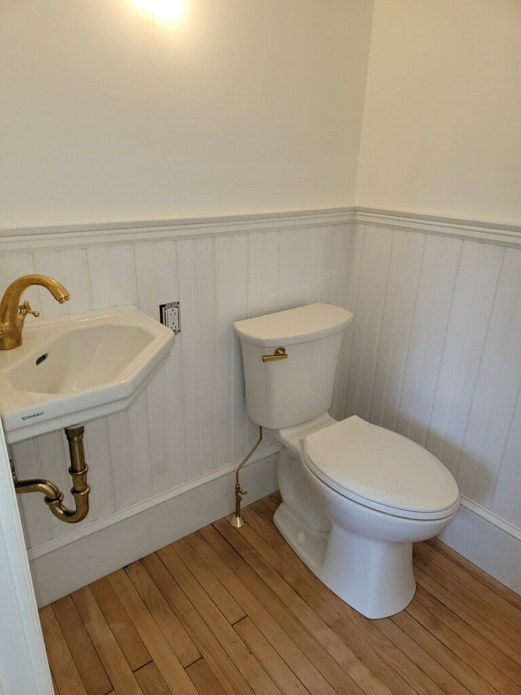 Slide of AT Plumbing Services