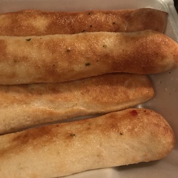 Greek's Pizzeria - three pieces of bread in a styrofoam container - Pizza Near Me - Noblesville, Indiana Greek's Pizzeria - three pieces of bread in a styrofoam container - Pizza Near Me - Noblesville, Indiana