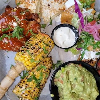 Que Onda - Que Ondra Sampler ( chicken taquitos, guacamole side, 4 wings, cheese quesadilla, corn on the cob) - Mexican Near Me - Huntersville, North Carolina Que Onda - Que Ondra Sampler ( chicken taquitos, guacamole side, 4 wings, cheese quesadilla, corn on the cob) - Mexican Near Me - Huntersville, North Carolina