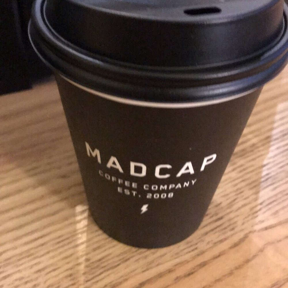 Madcap Coffee - 12oz of black coffee - $4.50 - Coffee Roasteries Near Me - Grand Rapids, Michigan Madcap Coffee - 12oz of black coffee - $4.50 - Coffee Roasteries Near Me - Grand Rapids, Michigan