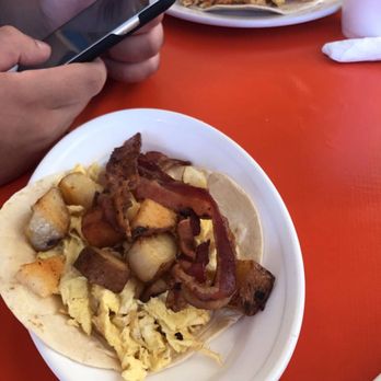 Raizes Mexican Kitchen - 2 chorizo and egg tacos and 1 bacon egg and potatoes - Mexican Near Me - Stafford, Texas Raizes Mexican Kitchen - 2 chorizo and egg tacos and 1 bacon egg and potatoes - Mexican Near Me - Stafford, Texas