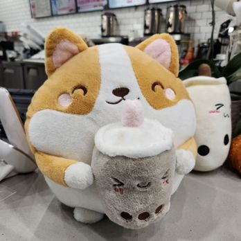 Tea-riffic Churro - a stuffed animal holding a cup of tea - Bubble Tea Near Me - Glendale, Arizona