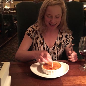 Metropolitan Grill - Birthday candle on tiramisu - American Near Me - Seattle, Washington Metropolitan Grill - Birthday candle on tiramisu - American Near Me - Seattle, Washington